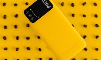 yellow nokia phone on yellow and white polka dot textile